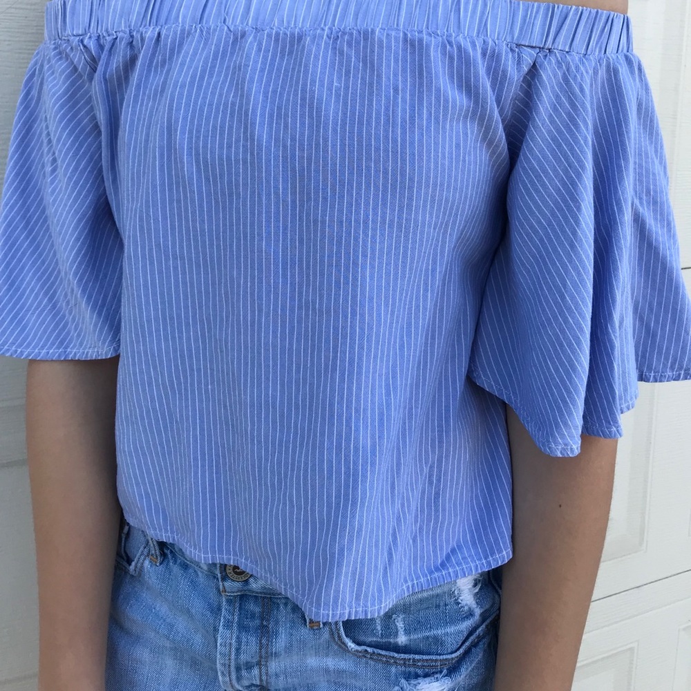 Off the shoulder shirt.